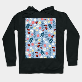 Spring meadow in bloom with ladybirds on sky blue background Hoodie